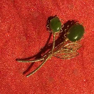 Goldstone brooch with faux jade stones